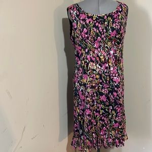 Beautiful floral sleeveless dress with small ruffled at hem